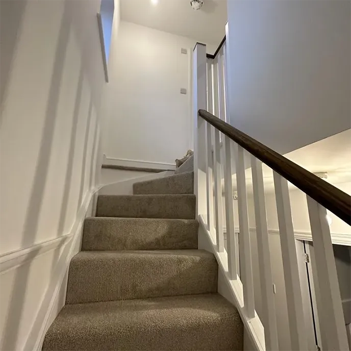A set of stairs leading up to a second floor.